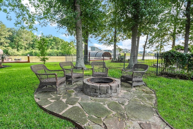 view of patio featuring an outdoor fire pit