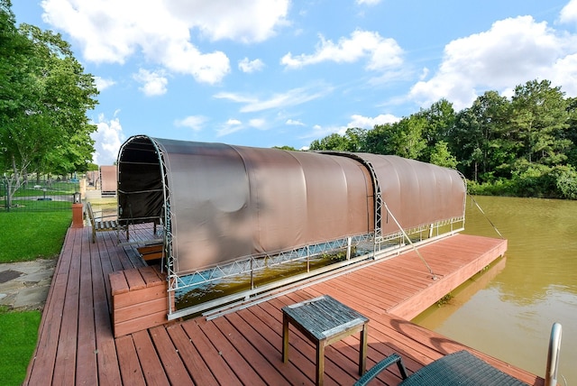 dock area with a water view