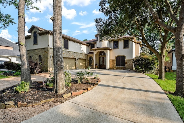 view of front of property with a garage