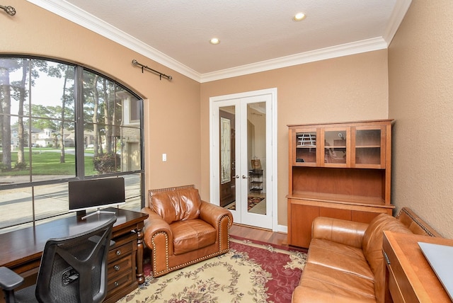 office featuring french doors, ornamental molding, a textured ceiling, and hardwood / wood-style floors