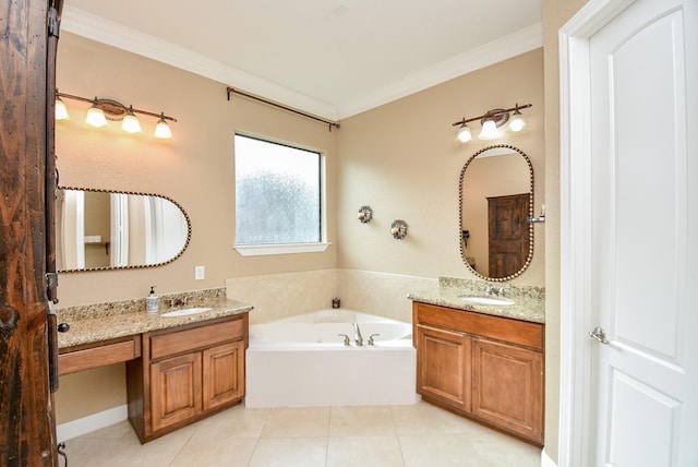 bathroom featuring ornamental molding, a tub to relax in, vanity, and tile patterned floors