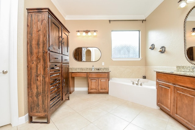 bathroom with vanity, crown molding, tile patterned flooring, and a bath