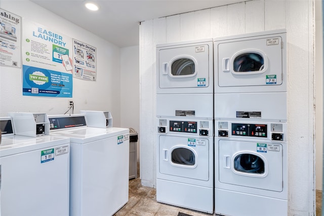 laundry room with washing machine and dryer and stacked washer and clothes dryer