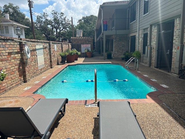 view of pool with a patio area