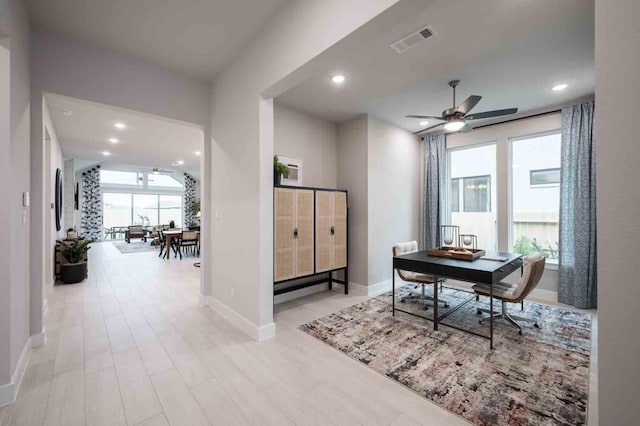 office area with ceiling fan and plenty of natural light