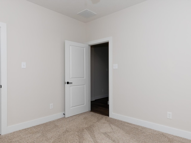 empty room with light carpet