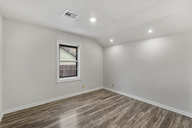 empty room featuring dark wood-type flooring