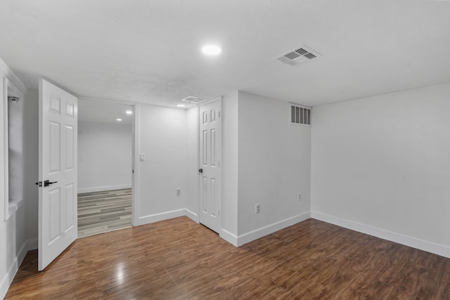 basement featuring wood-type flooring