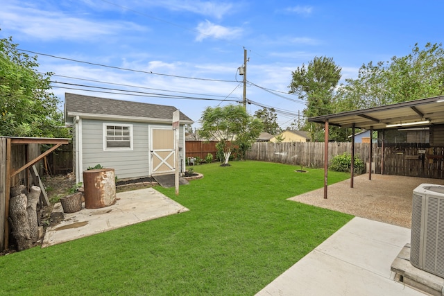 view of yard with central AC unit and a storage unit