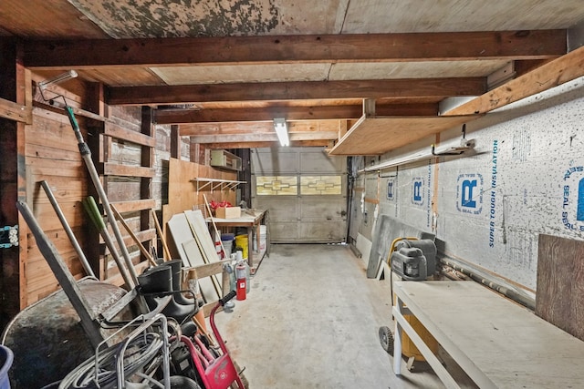 basement with a workshop area