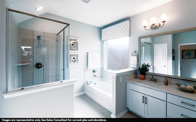 bathroom featuring vanity, vaulted ceiling, separate shower and tub, and tile patterned flooring