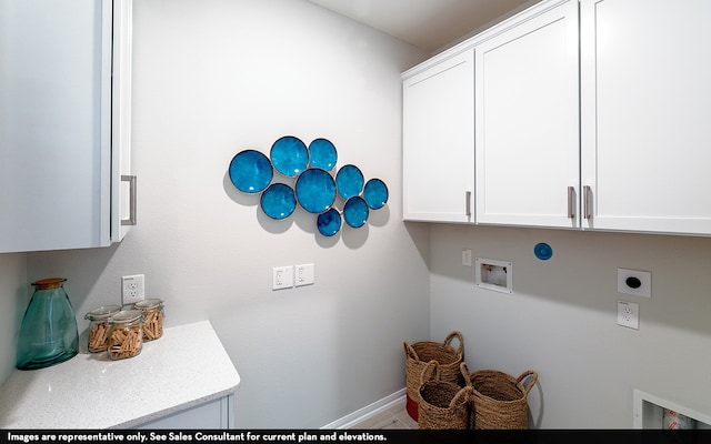 laundry room featuring hookup for an electric dryer, washer hookup, and cabinets