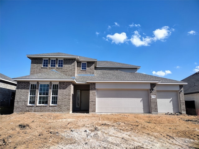 prairie-style house with a garage