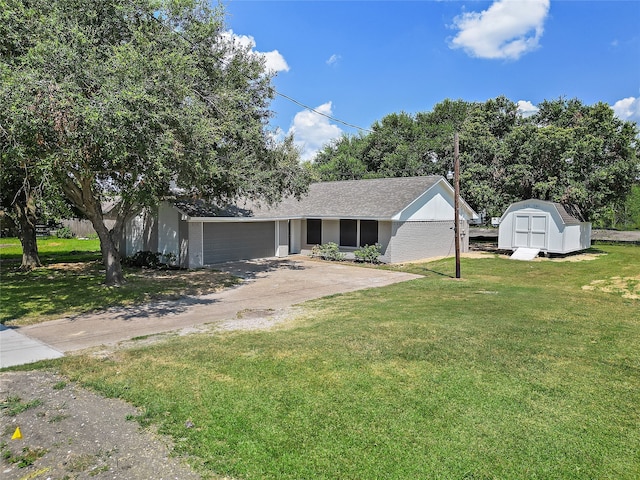 view of front of house with a shed and a front yard