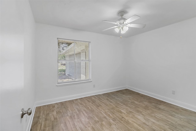 unfurnished room featuring light hardwood / wood-style floors and ceiling fan