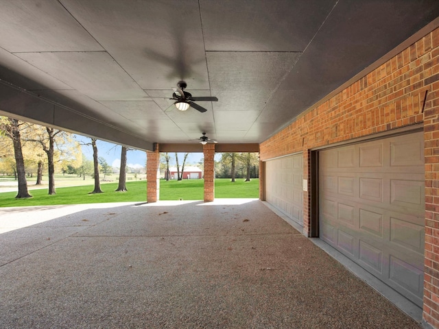 exterior space featuring ceiling fan and a yard