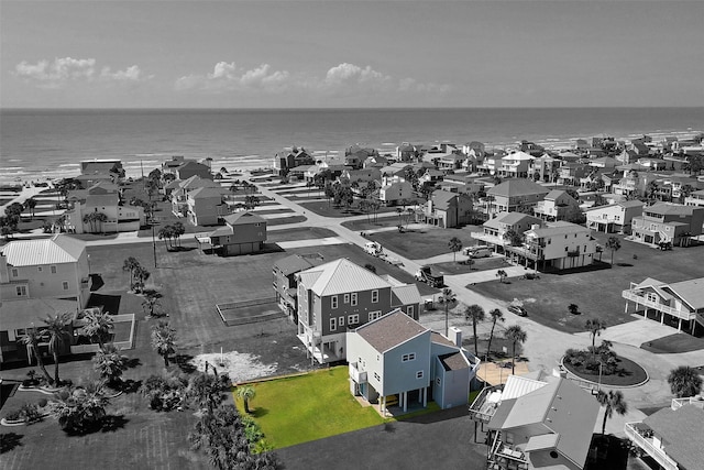 aerial view with a residential view and a water view