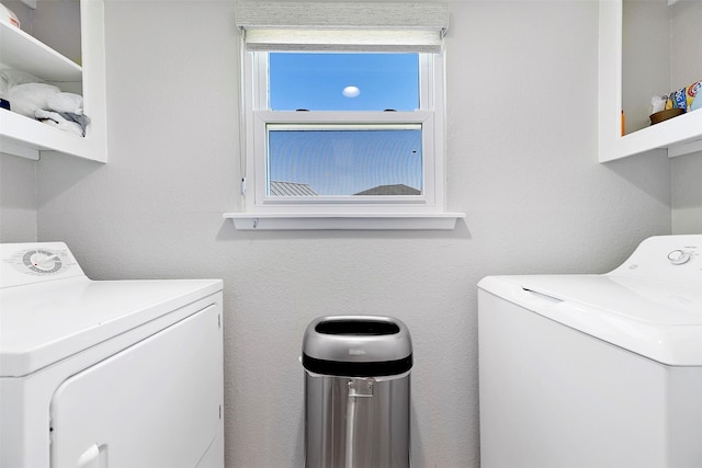 laundry area featuring laundry area and washer and clothes dryer