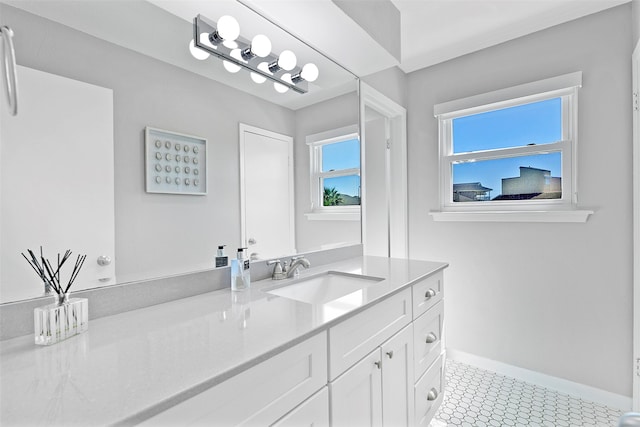 bathroom with vanity and tile patterned floors