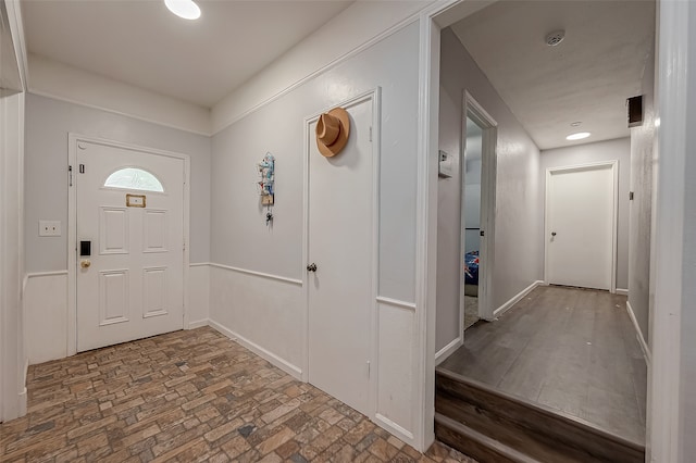 entryway featuring dark wood-type flooring