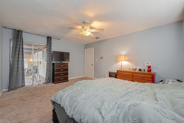 bedroom with ceiling fan and carpet