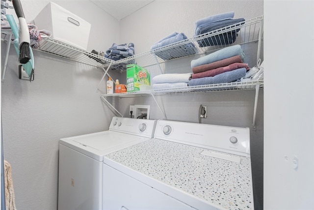 clothes washing area with laundry area and independent washer and dryer