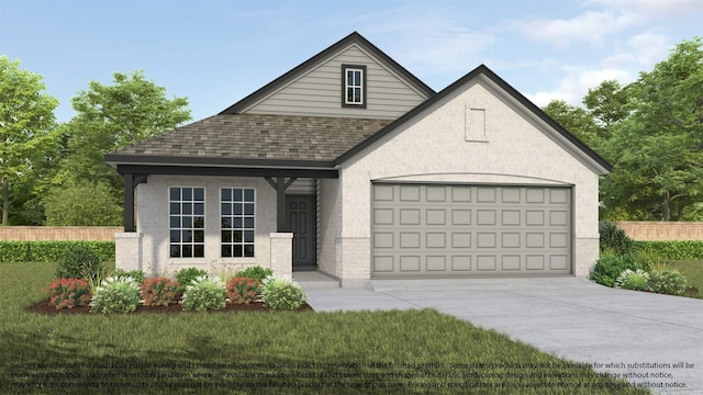 view of front of home featuring a garage and a front yard