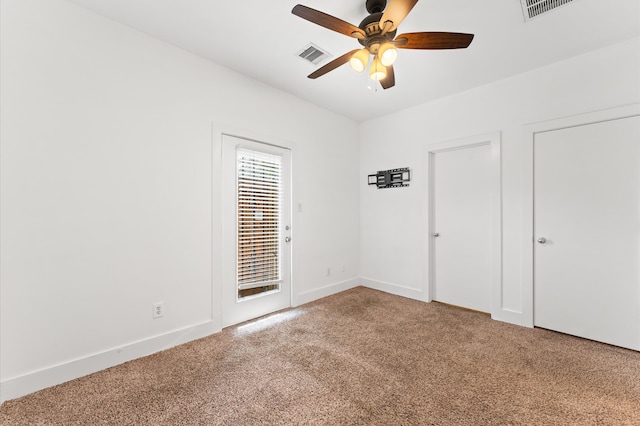 unfurnished bedroom with carpet and ceiling fan