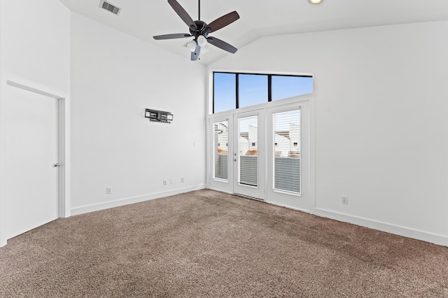 unfurnished room with ceiling fan, carpet, and high vaulted ceiling