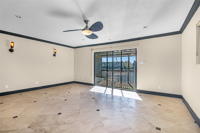 empty room with ceiling fan, ornamental molding, and a textured ceiling