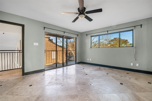 spare room featuring ceiling fan