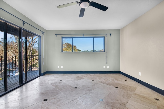 unfurnished room with ceiling fan