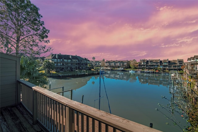 property view of water with a dock