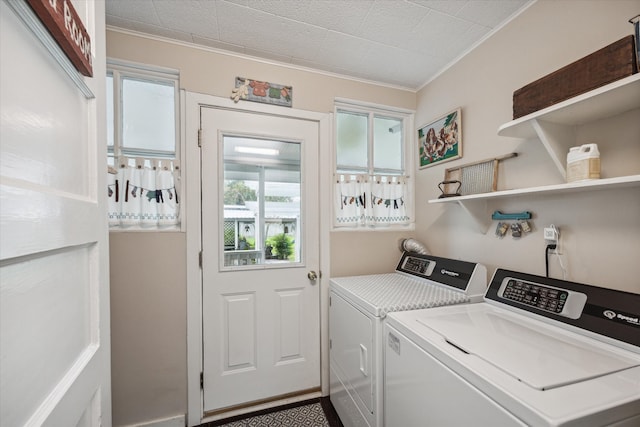 laundry room featuring washing machine and dryer