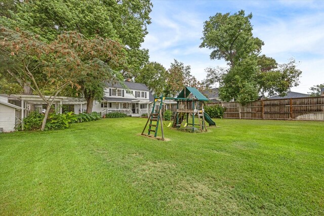 view of yard with a playground