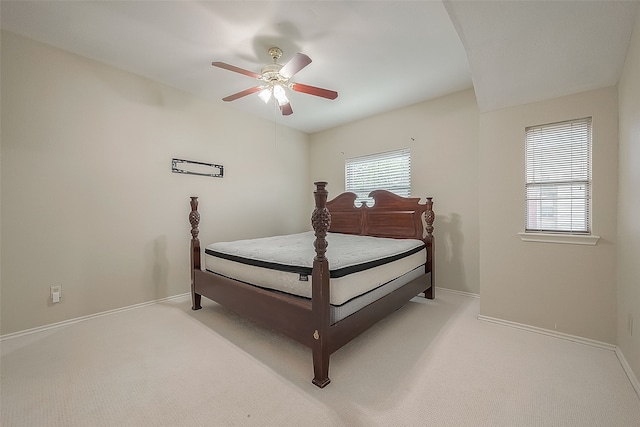 bedroom featuring ceiling fan and carpet floors