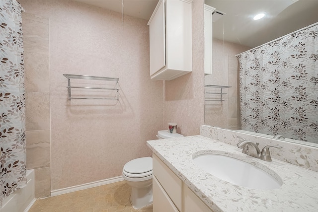 full bathroom with shower / tub combo, tile patterned flooring, toilet, and vanity