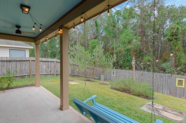 view of patio / terrace featuring ceiling fan