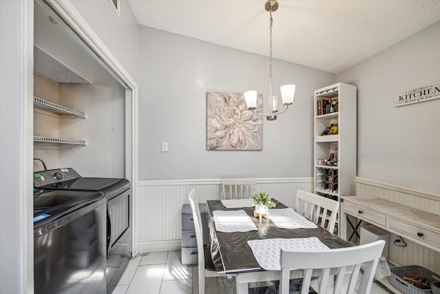 11835 Sandpiper Dr, Houston, TX 77035 - dining space featuring washing machine and dryer, a chandelier, and wainscoting