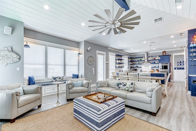 living room with wooden ceiling, light hardwood / wood-style flooring, and ceiling fan