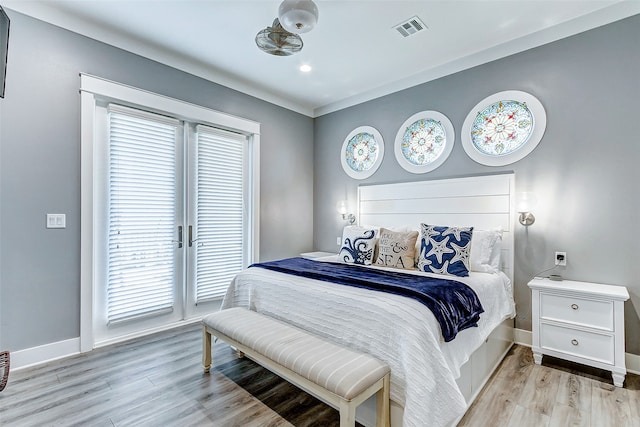 bedroom featuring light wood-type flooring