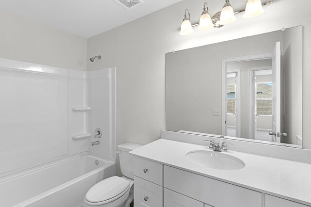 full bathroom with vanity, toilet, and shower / bathtub combination