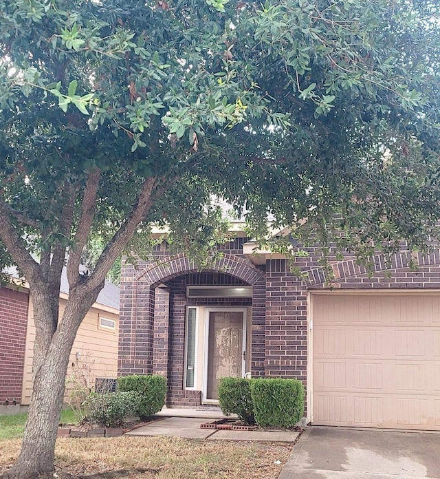 view of front of property with a garage