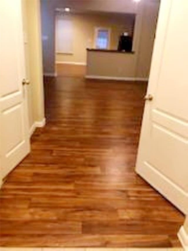 hall featuring dark hardwood / wood-style flooring