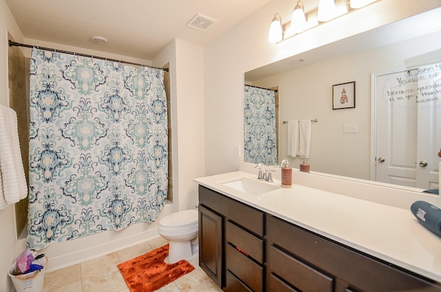 full bathroom with tile patterned flooring, visible vents, toilet, shower / tub combo with curtain, and vanity