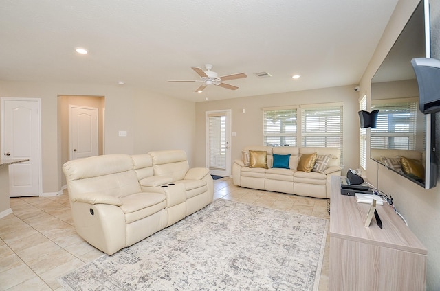 living area with recessed lighting, a ceiling fan, visible vents, and light tile patterned floors