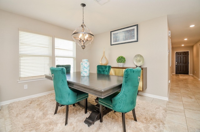 dining space featuring a notable chandelier, recessed lighting, baseboards, and light tile patterned floors