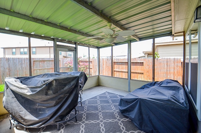 sunroom / solarium with vaulted ceiling and ceiling fan