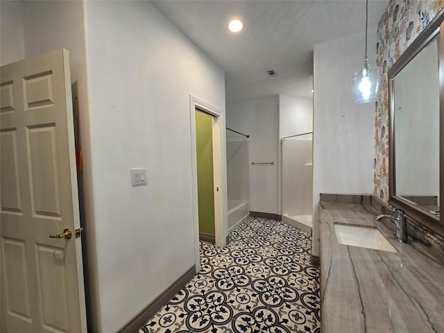 bathroom with sink and a shower