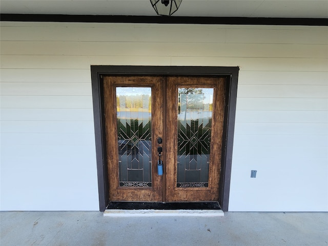 doorway to property featuring french doors